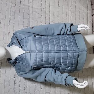 Blue puffer style jacket